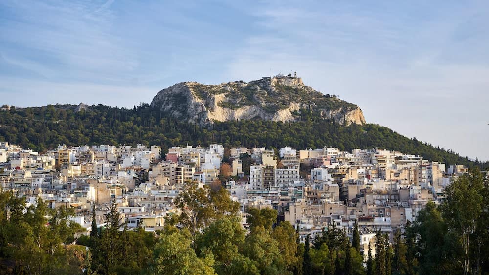 A panorama of Mount Lycabettus with Athens in the foreground.