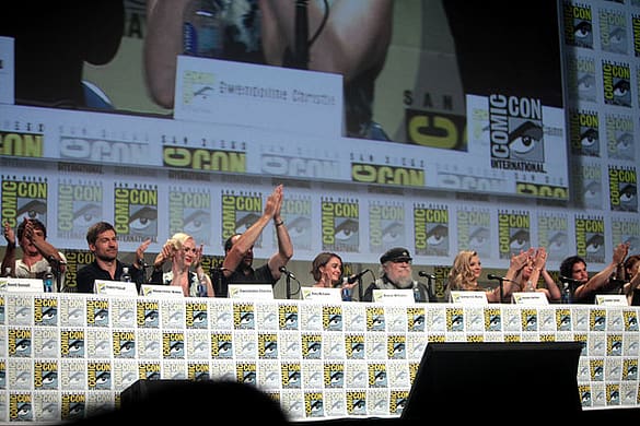 Pedro Pascal, Nikolaj Coster-Waldau, Gwendoline Christie, Rory McCann, Maisie Williams, George R. R. Martin, Natalie Dormer, Sophie Turner and Kit Harrington speaking at the 2014 San Diego Comic Con International, for "Game of Thrones", at the San Diego Convention Center in San Diego, California. Photo by Greg Skidmore.